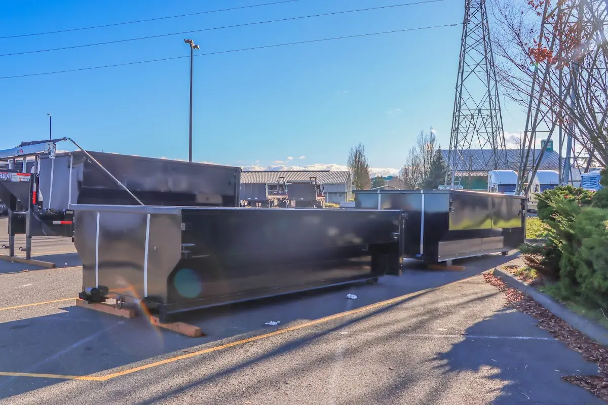 Roll-off dumpster ready for waste disposal at job site for 12 Yard Dumpster Rental in Harker Heights